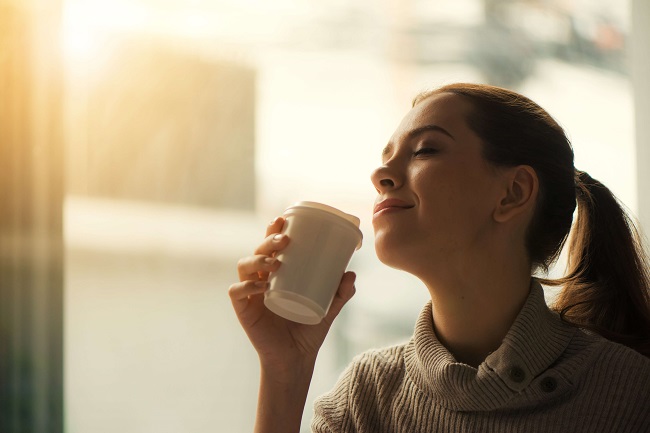 girl sipping coffee