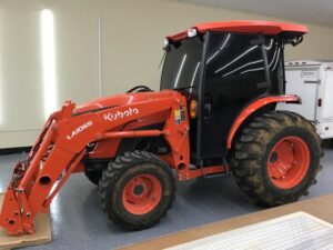 Kubota tractor with paint and window protection